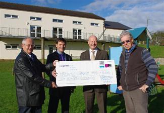 Halwill Parish Hall receives the cheque from Cllr Parsons